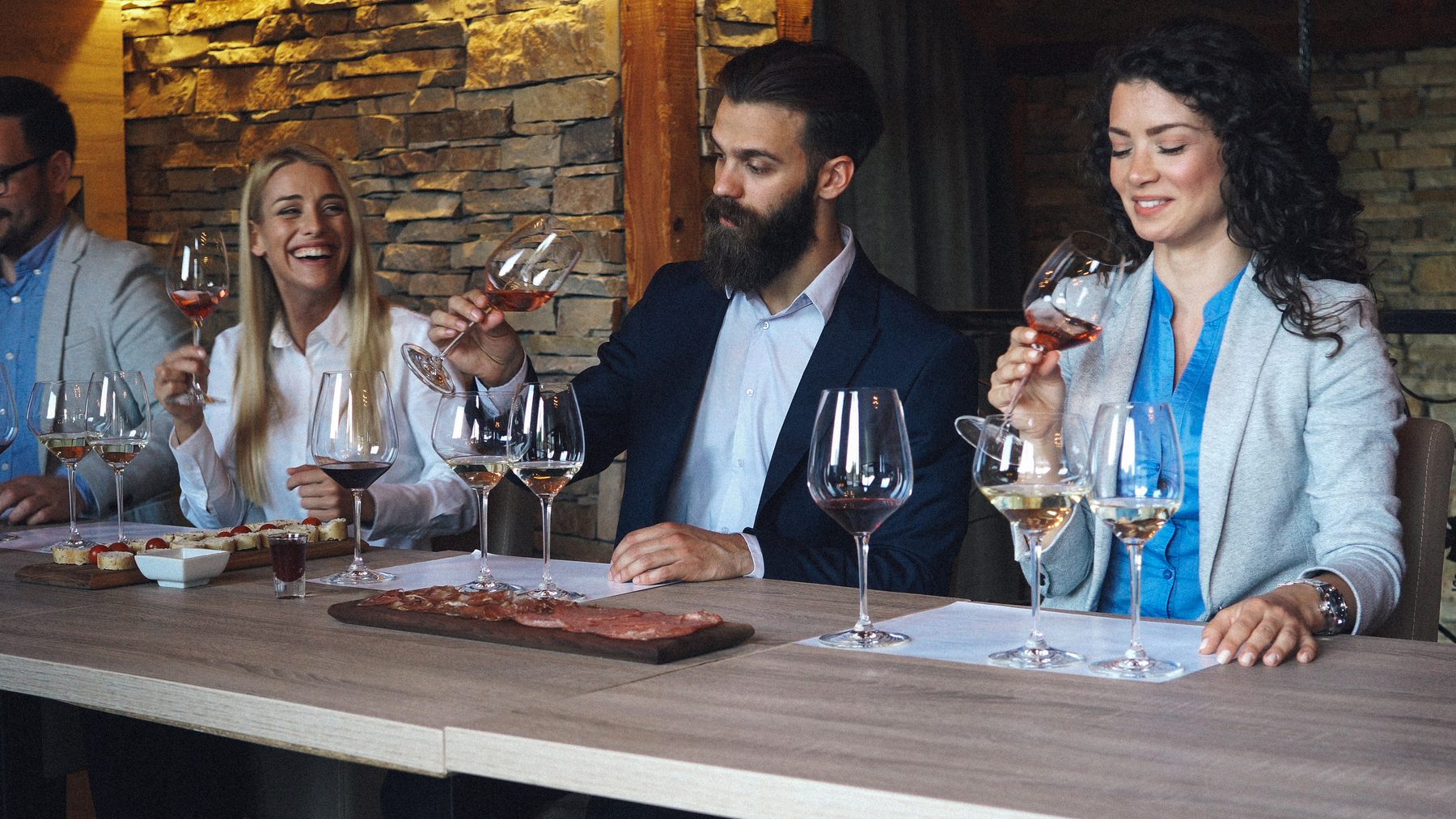 Guests tasting and comparing wines at a guided tasting
